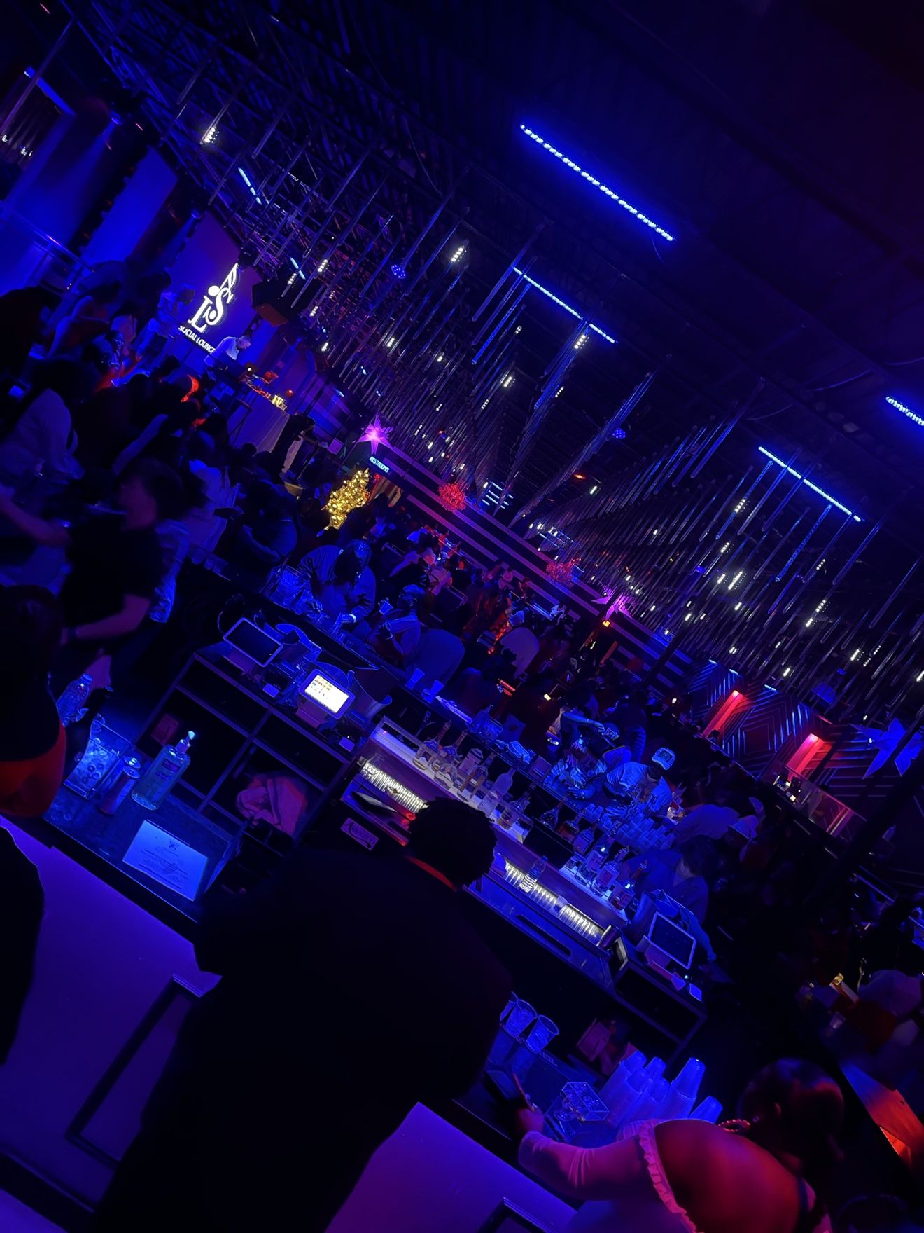 Nightclub crowd under the lights at a TeamMTS event